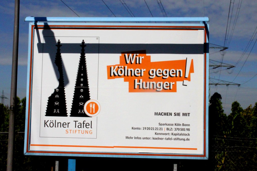 Werbetafel: «Wir Kölner gegen Hunger».